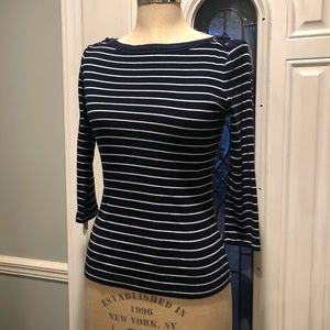 Navy blue and white striped polo shirt